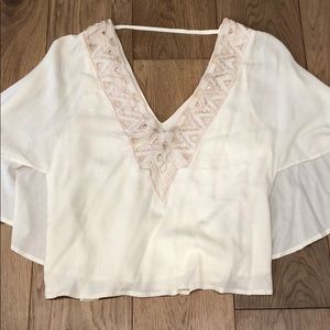 Cropped cape blouse